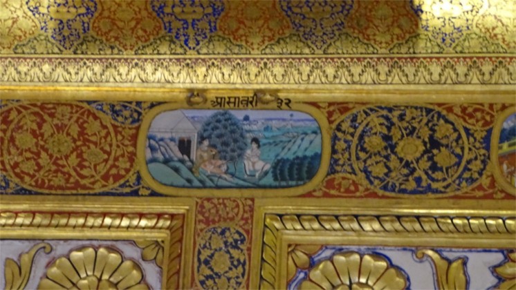 Pictures of the ragas in the lower panel below the ceiling